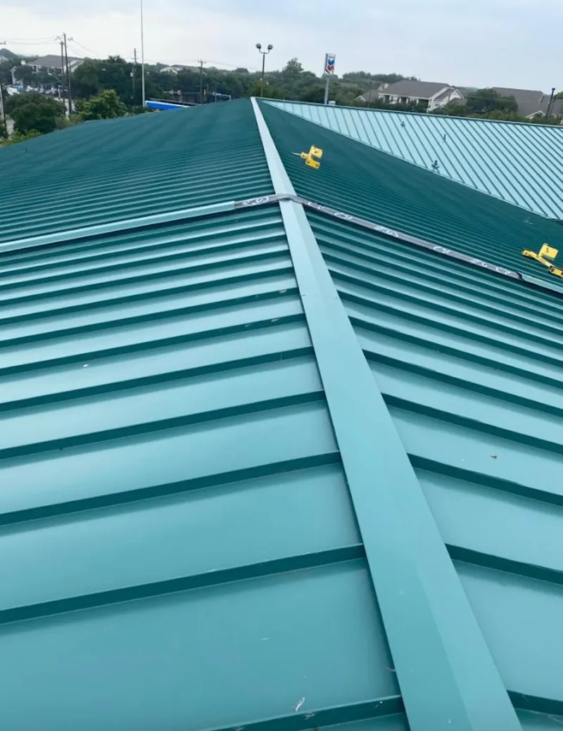 Green commercial metal roof ridge and valley for Metal Roof Repair in West Chester